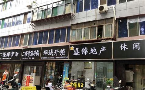 黑底招牌|沿街店铺统一黑底招牌？城市管理不能“一刀切”